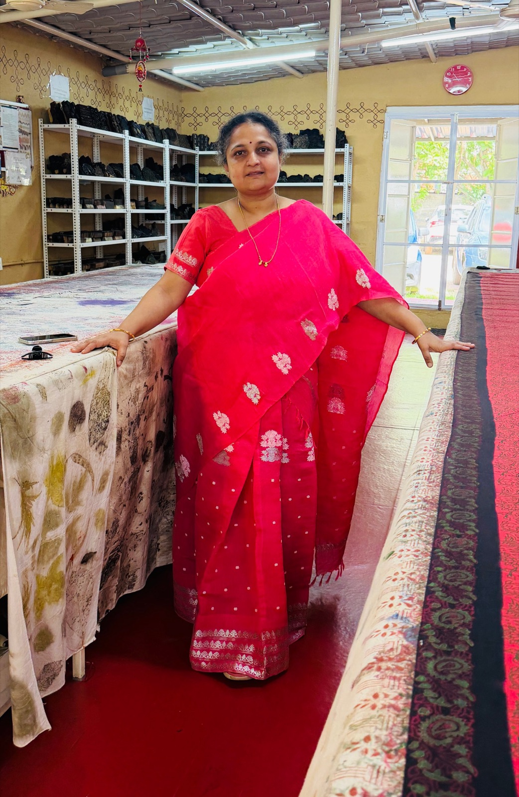 RangMudra team member demonstrating eco printing with botanical leaves